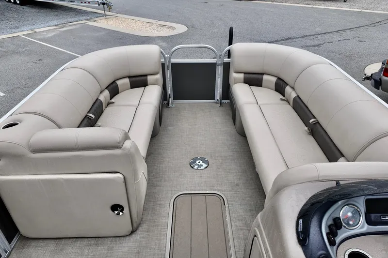 Slide: The Image of 2023 Sun Tracker Party Barge 22 DLX interior with spacious seating and modern design. - 9
