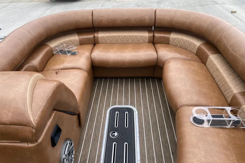 Slide: The Image of Luxurious seating on 2022 Premier 270 Intrigue RF boat with tan leather upholstery. - 4