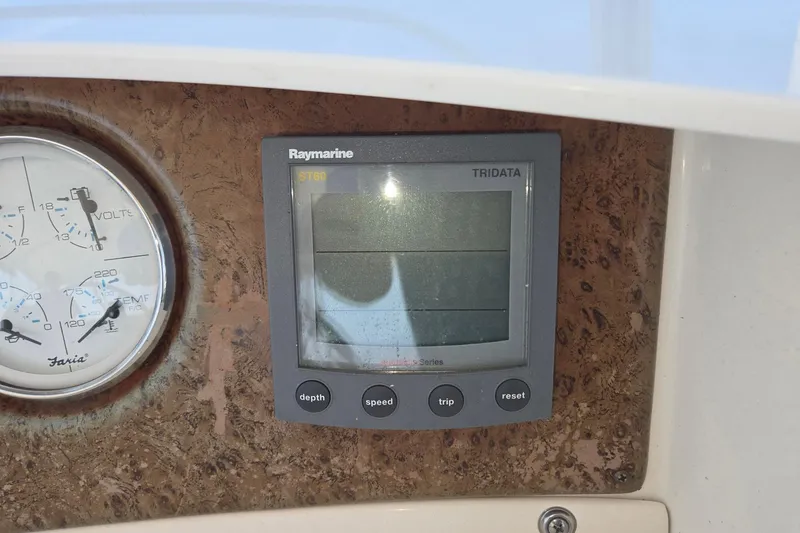 Slide: The Image of Raymarine ST60 Tridata display and Faria gauges on 2003 Silverton 392 Motor Yacht. - 22