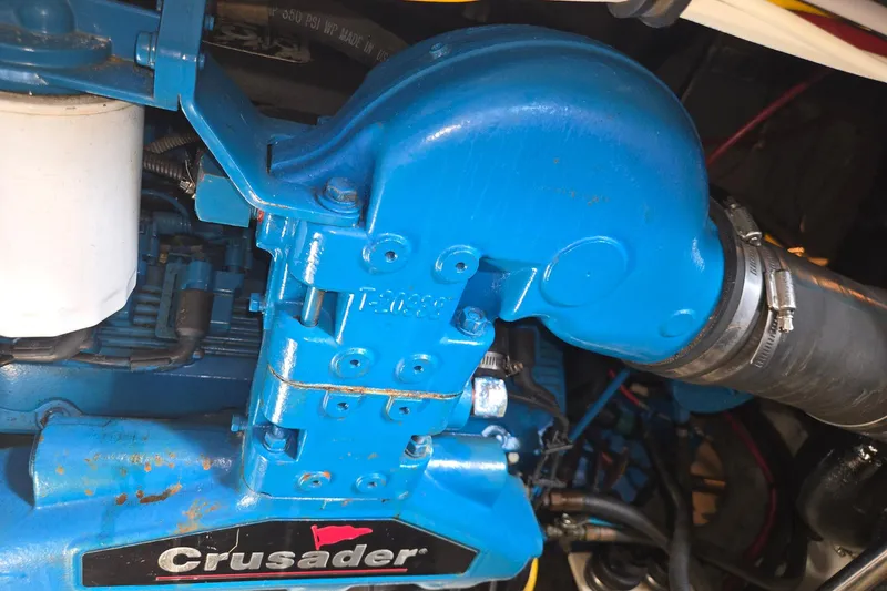Slide: The Image of Close-up of a blue Crusader engine in a 2003 Silverton 392 Motor Yacht. - 33