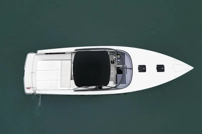 Slide: The Image of Overhead view of 2016 VanDutch CRUISER boat on calm water. - 2