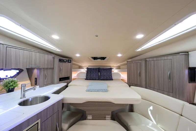 Slide: The Image of Luxurious interior of 2020 Regal 35 Sport Coupe with modern amenities and cozy seating. - 24