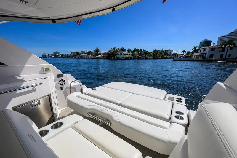 Slide: The Image of Luxurious 2020 Regal 35 Sport Coupe yacht interior with waterfront view. - 5