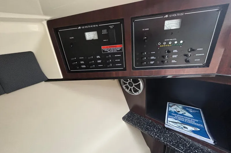 Slide: The Image of Control panel of a 2014 Monterey 328 Super Sport boat interior. - 22