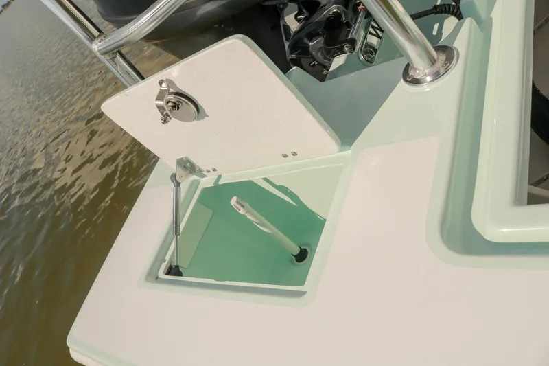 Slide: The Image of Open hatch on 2026 Willy Roberts 20 Bonefish boat, showing interior compartment. - 18