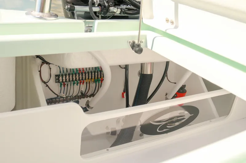 Slide: The Image of Interior view of 2026 Willy Roberts 20 Bonefish boat showing wiring and components. - 19