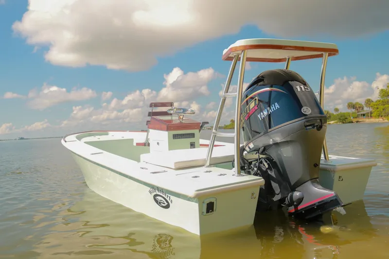 Slide: The Image of 2026 Willy Roberts 20 Bonefish boat with Yamaha engine on calm water under cloudy sky. - 8