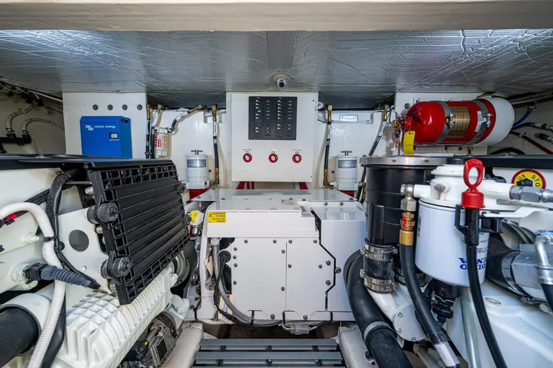 Slide: The Image of Engine room of 2020 Tiara Yachts C44 Coupe, featuring advanced mechanical systems and equipment. - 41