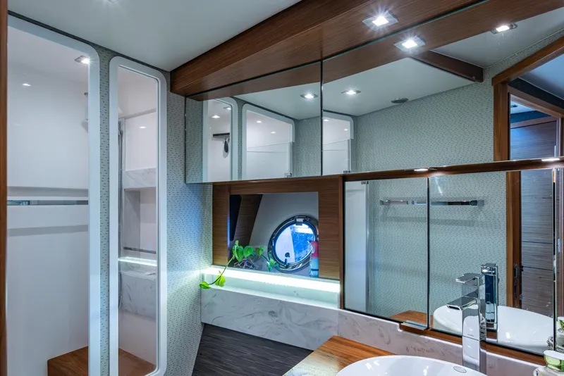 Slide: The Image of Luxurious bathroom interior of 2020 Tiara Yachts C44 Coupe with modern fixtures and elegant design. - 46