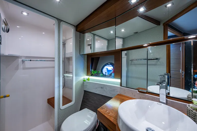 Slide: The Image of Luxurious bathroom interior of 2020 Tiara Yachts C44 Coupe with modern fixtures and elegant design. - 47