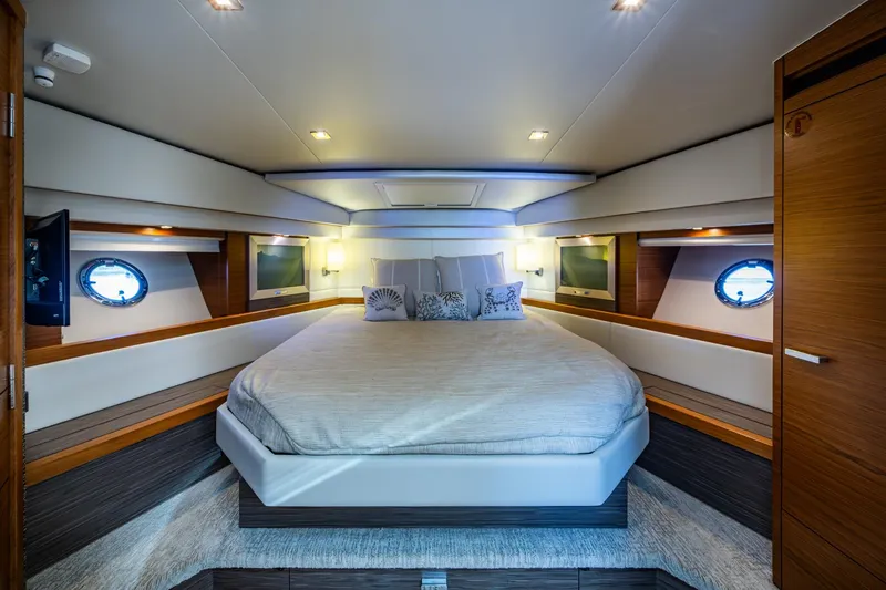 Slide: The Image of Luxurious 2020 Tiara Yachts C44 Coupe bedroom with elegant design and modern amenities. - 50