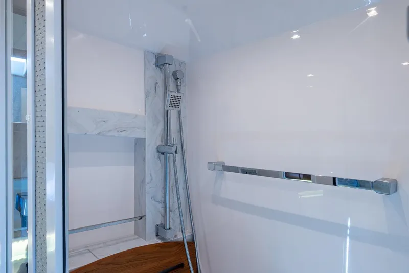 Slide: The Image of Luxurious shower area in 2020 Tiara Yachts C44 Coupe, featuring modern fixtures and sleek design. - 58