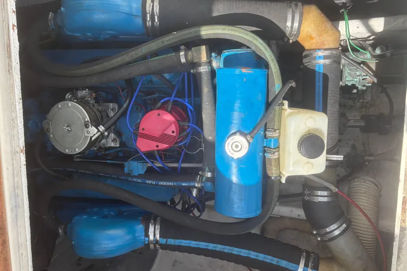 Slide: The Image of Engine compartment of a 1998 Bertram 33 Convertible Sport Fisherman boat. - 12