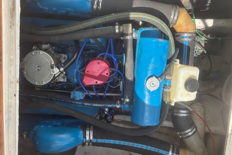 Slide: The Image of Engine compartment of a 1998 Bertram 33 Convertible Sport Fisherman boat. - 13