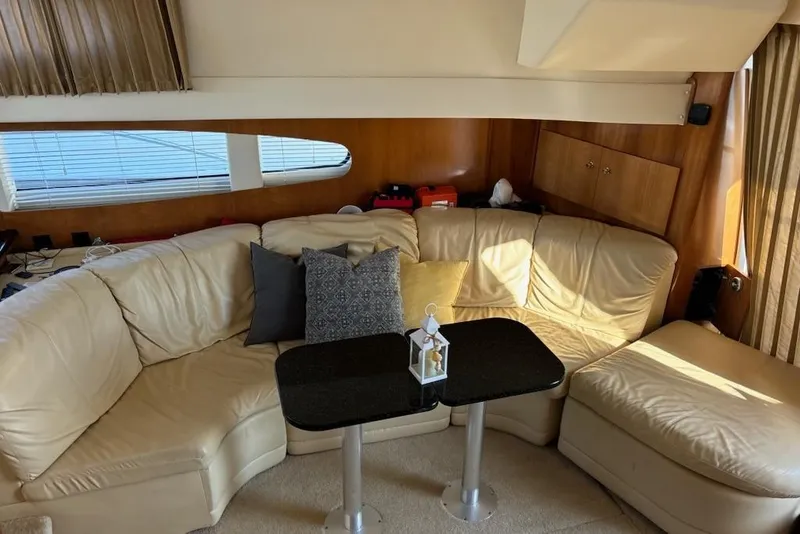 Slide: The Image of Luxurious interior of 2002 Carver 410 Sport Sedan with leather seating and elegant decor. - 5