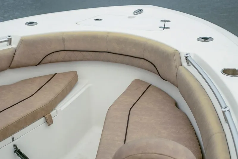 Slide: The Image of 2019 Sportsman Open 212 Center Console boat interior with cushioned seating. - 13