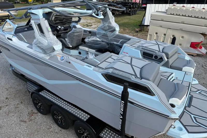 Slide: The Image of 2026 Nautique Super Air Nautique G23 Paragon boat with sleek design and modern features. - 10
