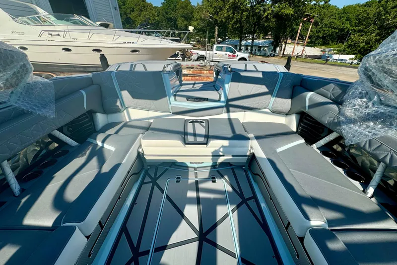 Slide: The Image of 2026 Nautique Super Air Nautique G23 Paragon interior with luxurious seating and modern design. - 12