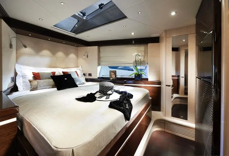 Slide: The Image of Luxurious bedroom interior of 2014 Sunseeker Predator 68 yacht with elegant decor and skylight. - 11