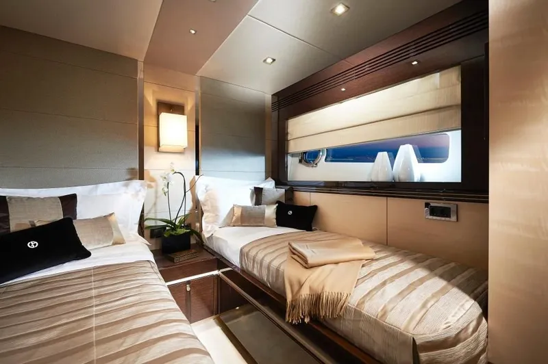 Slide: The Image of Luxurious cabin interior of 2014 Sunseeker Predator 68 yacht with twin beds. - 12