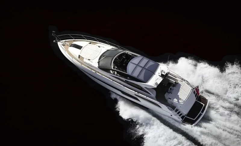 Slide: The Image of Aerial view of 2014 Sunseeker Predator 68 yacht cruising on water. - 4