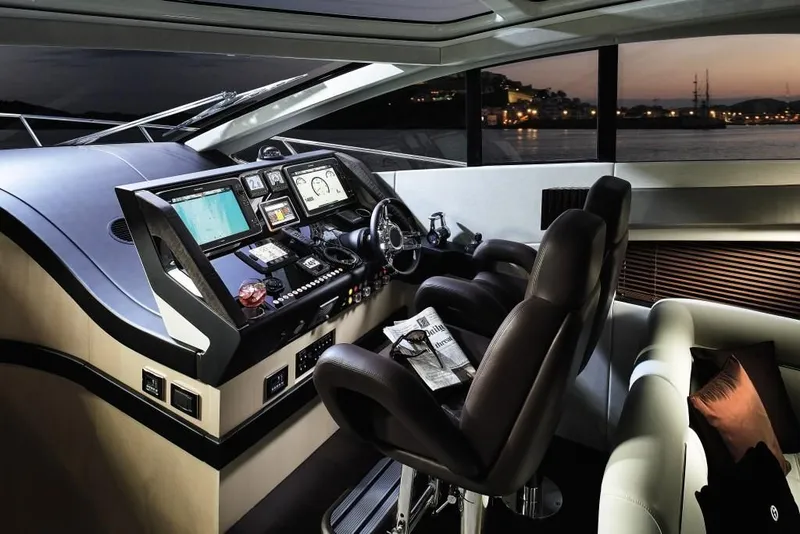 Slide: The Image of Luxurious interior of 2014 Sunseeker Predator 68 yacht cockpit at sunset. - 5