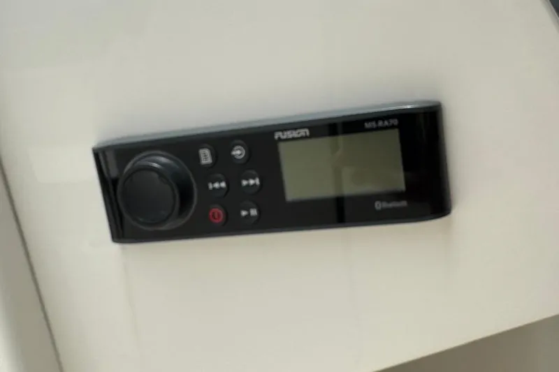 Slide: The Image of Fusion MS-RA70 Bluetooth stereo on 2020 Bayliner DX2200 boat dashboard. - 19