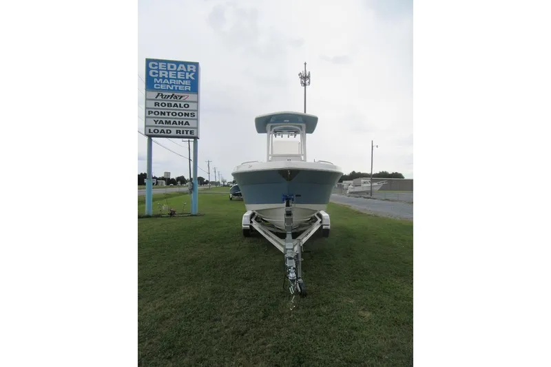 Slide: The Image of 2026 Robalo R222 Center Console boat on trailer at Cedar Creek Marine Center. - 3