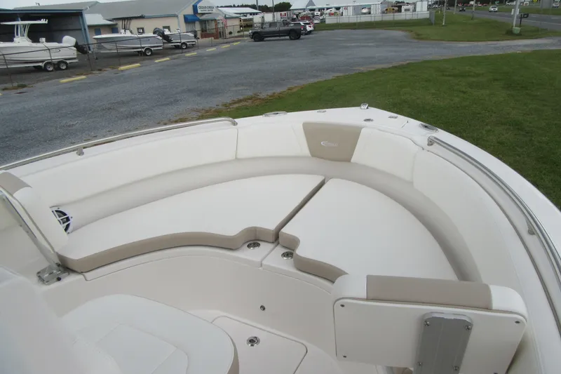 Slide: The Image of 2026 Robalo R222 Center Console boat with spacious seating area. - 4