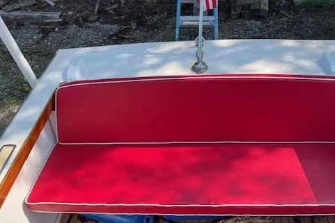 Slide: The Image of 1963 Chris-Craft Sea Skiff steering wheel with classic wooden dashboard. - 10