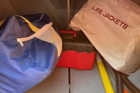 Slide: The Image of 1963 Chris-Craft Sea Skiff with red cushioned seating and wooden deck. - 13