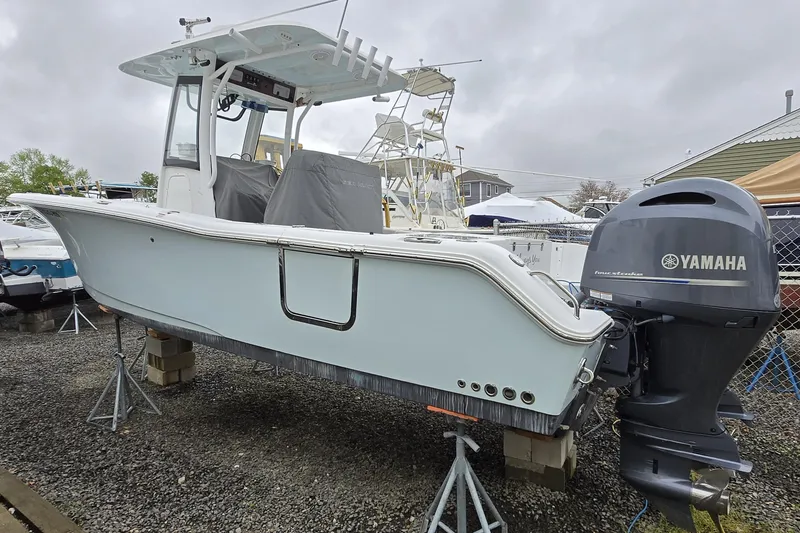 Slide: The Image of 2020 Sea Hunt Gamefish 25 boat with Yamaha outboard engine on display. - 14