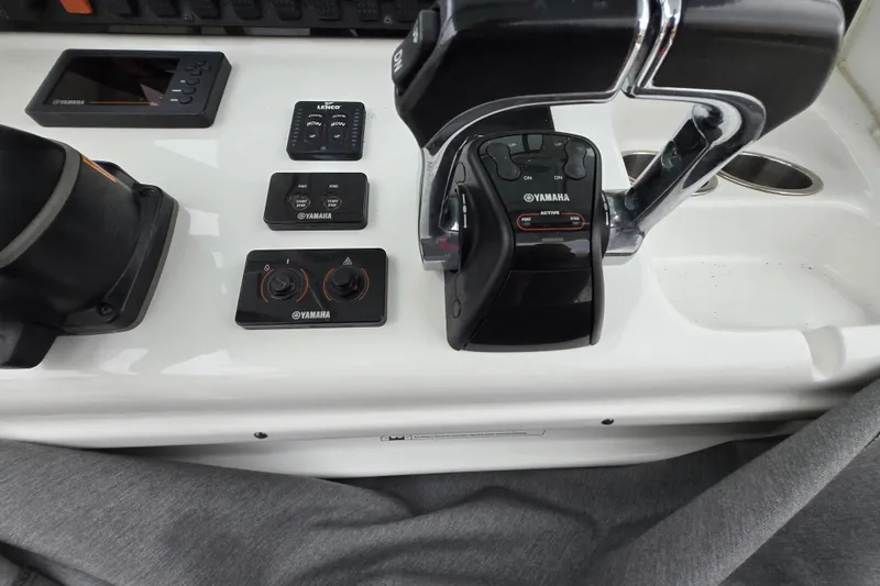 Slide: The Image of Control panel of a 2020 Sea Hunt Gamefish 25 boat with Yamaha controls. - 16
