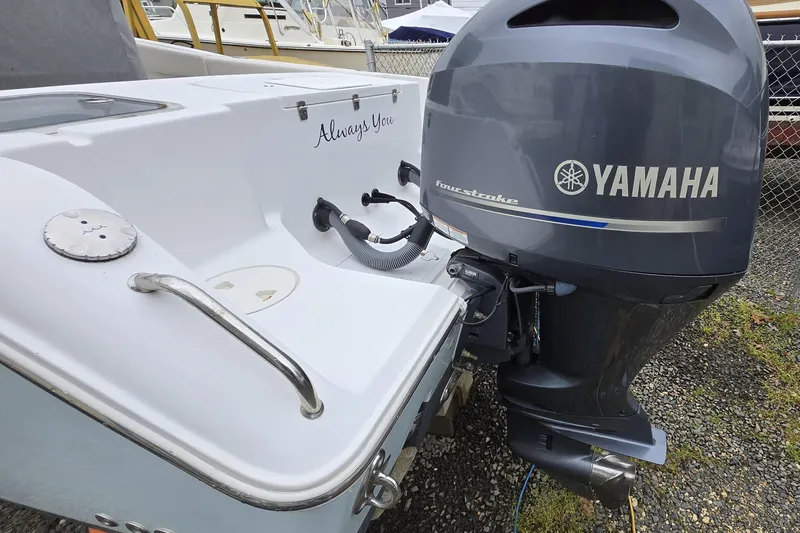 Slide: The Image of 2020 Sea Hunt Gamefish 25 with Yamaha four-stroke outboard motor. - 27