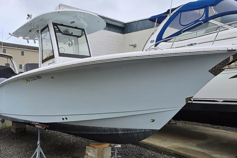 Slide: The Image of 2020 Sea Hunt Gamefish 25 boat on display, featuring sleek design and modern amenities. - 5