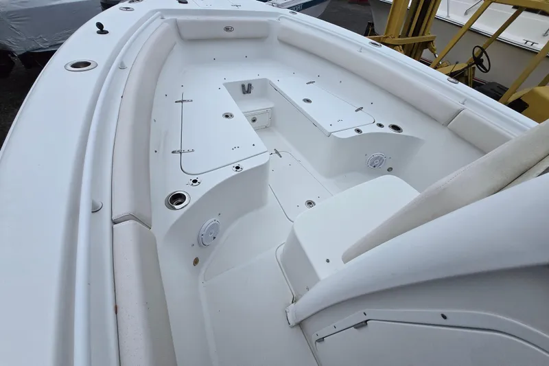 Slide: The Image of 2020 Sea Hunt Gamefish 25 boat interior with seating and storage compartments. - 6
