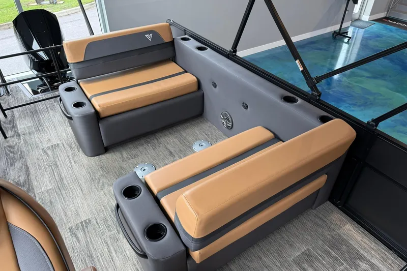 Slide: The Image of Interior of 2025 Viaggio Lago X-D boat with tan and gray seating. - 10