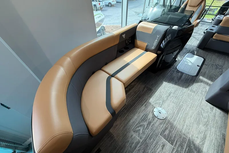Slide: The Image of Luxurious interior of 2025 Viaggio Lago X-D with tan and black seating. - 5