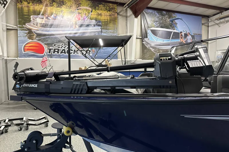 Slide: The Image of 2023 Tracker TARGA boat with Lowrance Ghost trolling motor in showroom. - 10