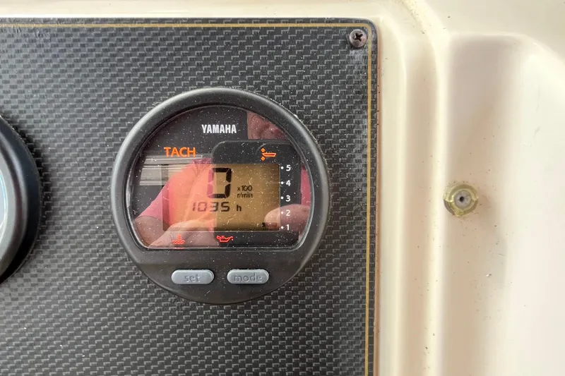 Slide: The Image of Yamaha tachometer on 2004 Grady-White Gulfstream 232, displaying 1035 hours. - 31