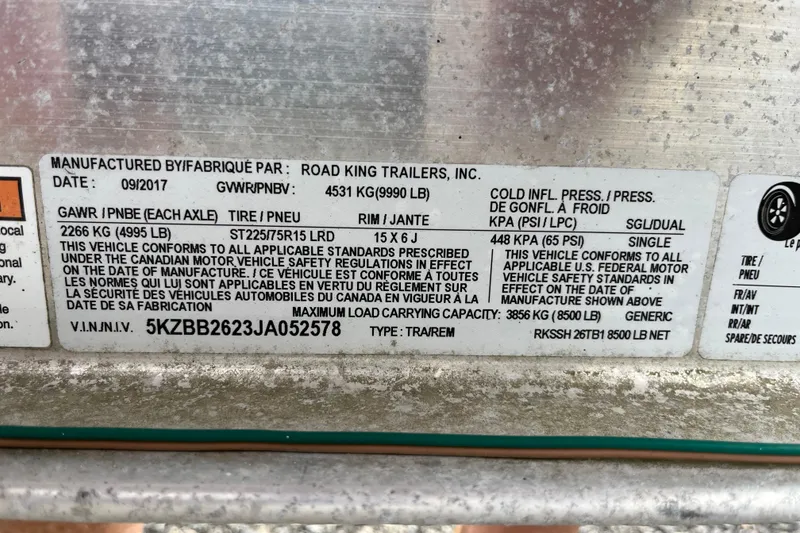 Slide: The Image of Label on Road King Trailers, Inc. vehicle, manufactured 09/2017, showing specifications and compliance details. - 42