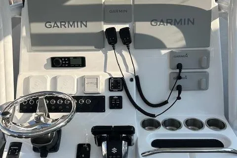 Slide: The Image of 2023 Cape Horn 32 XS boat dashboard with Garmin electronics and controls. - 5