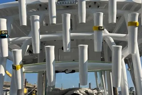 Slide: The Image of 2023 Cape Horn 32 XS boat with multiple rod holders on the deck. - 11