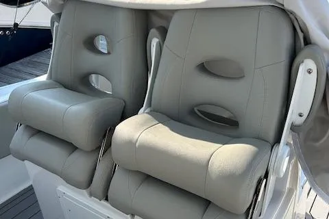 Slide: The Image of 2023 Cape Horn 32 XS boat with comfortable gray seating. - 3