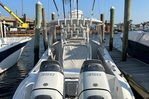 Slide: The Image of 2023 Cape Horn 32 XS boat docked with twin 350 engines. - 4