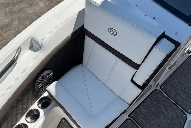 Slide: The Image of Luxurious seating on 2026 Cobalt R6 Outboard boat with cup holders and speaker. - 12
