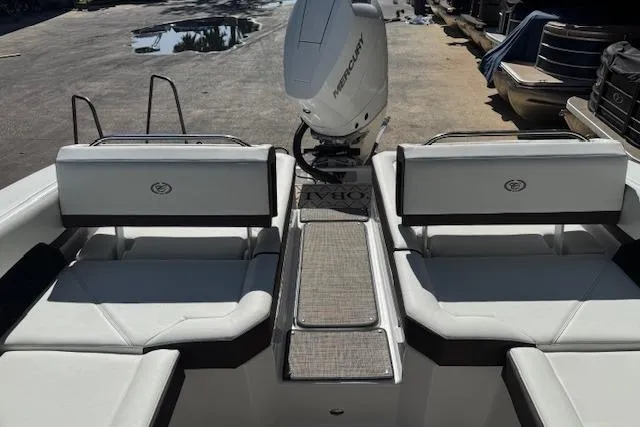 Slide: The Image of 2026 Cobalt R6 Outboard boat interior with seating and Mercury engine. - 19