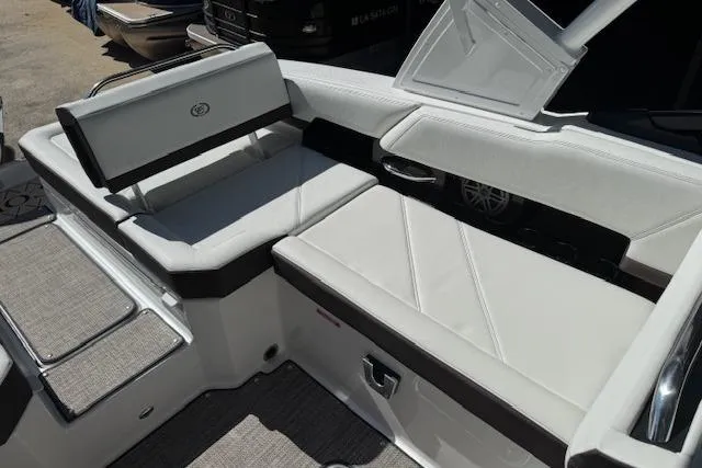 Slide: The Image of 2026 Cobalt R6 Outboard boat interior with white seating and modern design. - 20