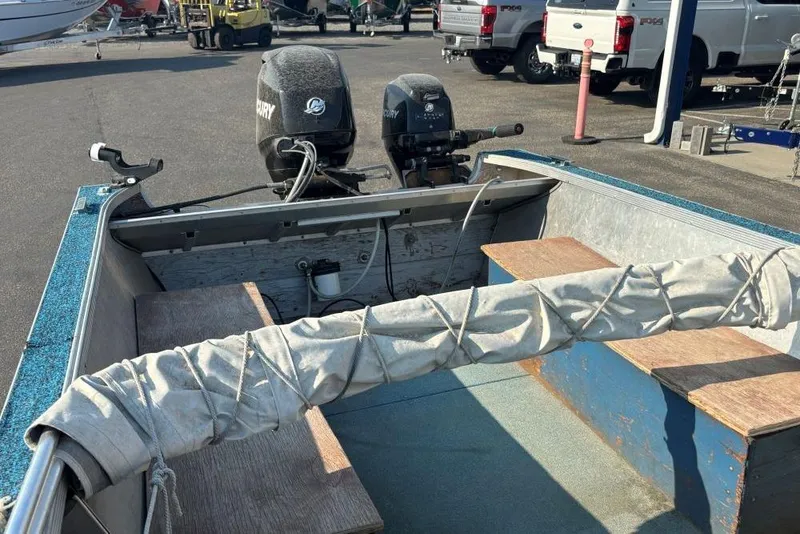 Slide: The Image of 1984 Hewescraft River Runner 16 boat with dual Mercury outboard motors. - 6