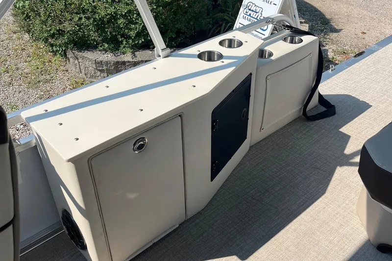 Slide: The Image of 2026 Avalon 23 LSZ Cruise Rear Bench with cup holders and storage compartments. - 3